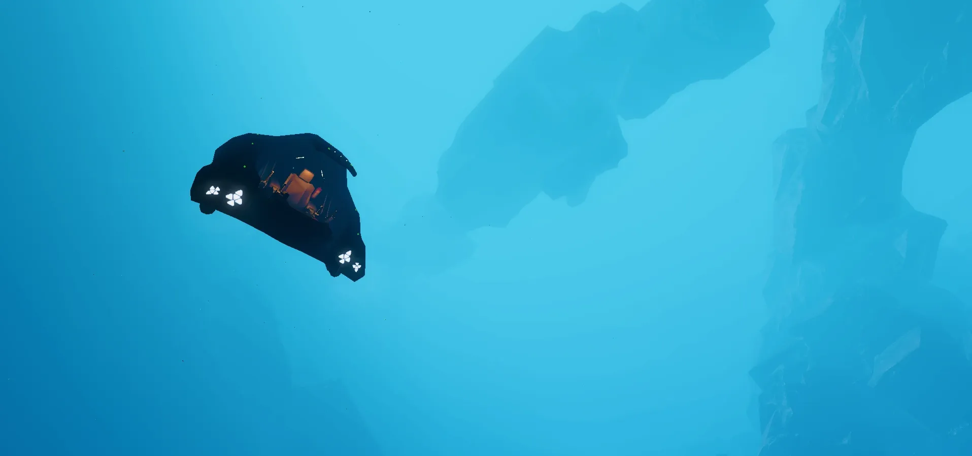 Submersible exploring a lit cavern